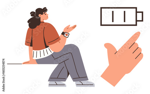 Woman wearing smartwatch, sitting cross-legged, gesturing as low battery icon signifies energy depletion. Ideal for technology, lifestyle, energy awareness, health tracking, minimalism, time