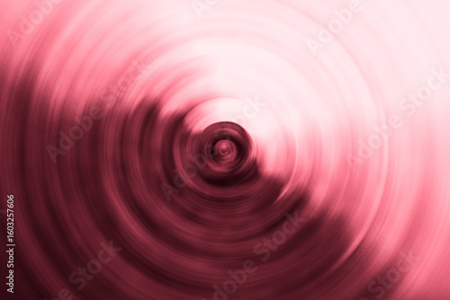 Geometric rotating background in red. Abstract creative texture for template. Modern and simple radial pattern.