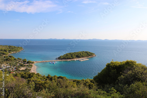 island plaža riva podvrške with ocean skyline from viewpoint veli vrh, Murter, Croatia