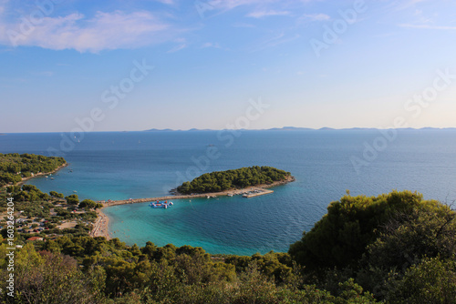 island plaža riva podvrške with ocean skyline from viewpoint veli vrh, Murter, Croatia