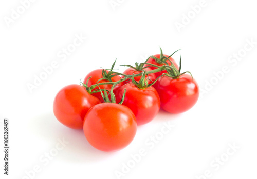 A branch of red tomatoes, Cocktail tomatoes isolated on a white background