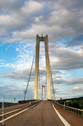 Högakustenbron: Majestic Cable-Stayed Bridge Over Ångermanälven River Under Dynamic Skies – Modern Swedish Engineering Marvel