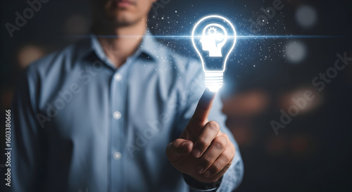 Wallpaper Mural Businessman activating innovative ideas with lightbulb concept representing business solutions Torontodigital.ca