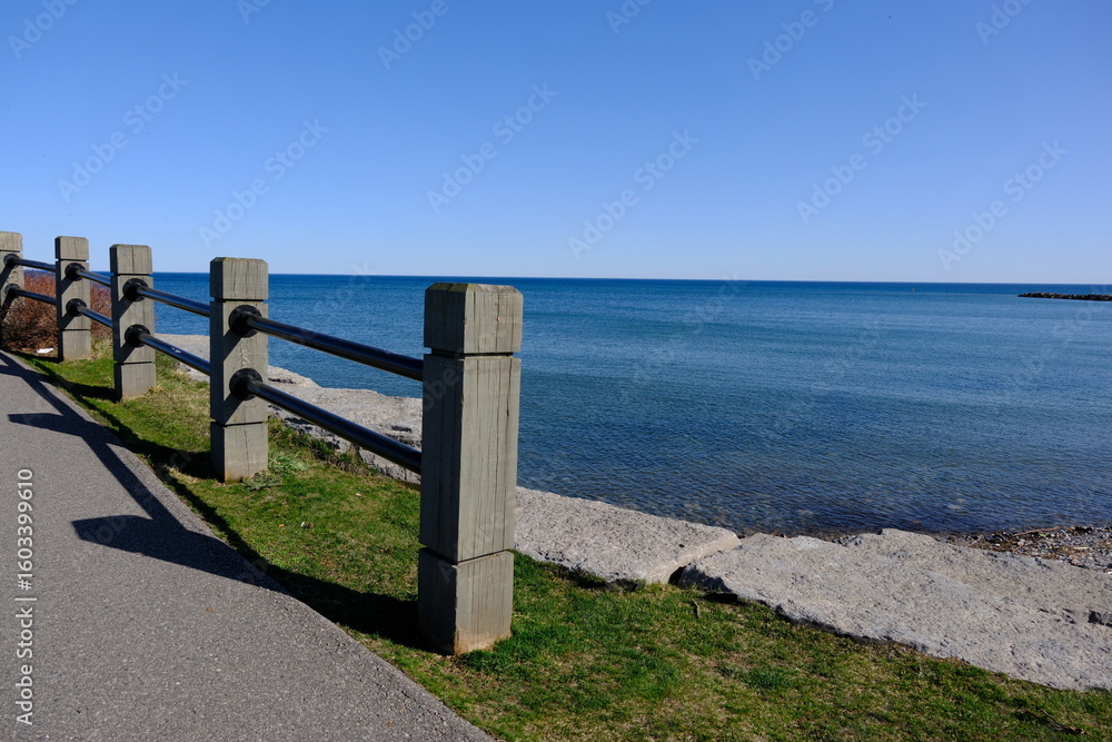Fototapeta premium fence of a park in bowmanville on the shores of lake ontario