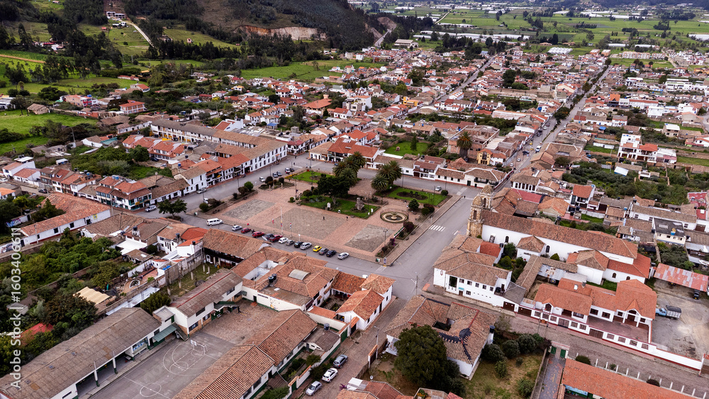 Obraz premium Tibasosa, Boyaca - Colombia. May 8, 2025. Aerial view from a drone, with a temperature of 18 degrees Celsius.