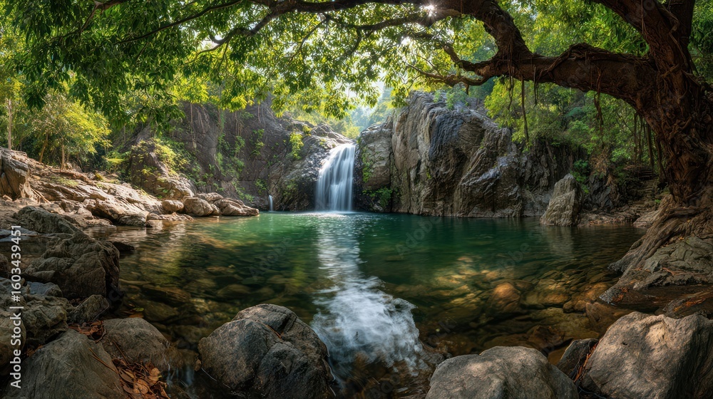 Fototapeta premium Lush waterfall cascading into a tranquil pool, shaded by a large, ancient tree