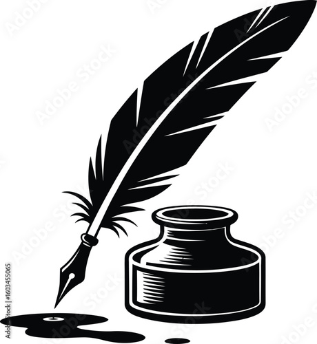 Vintage quill pen and ink bottle with ink spill