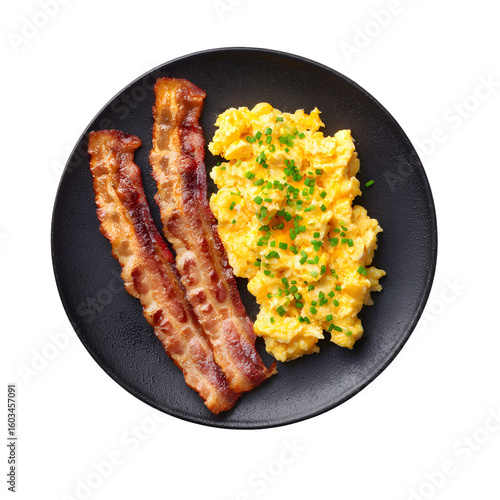 Delicious breakfast featuring crispy bacon and fluffy scrambled eggs presentation