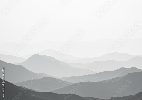 Gray mountains fade into soft mist