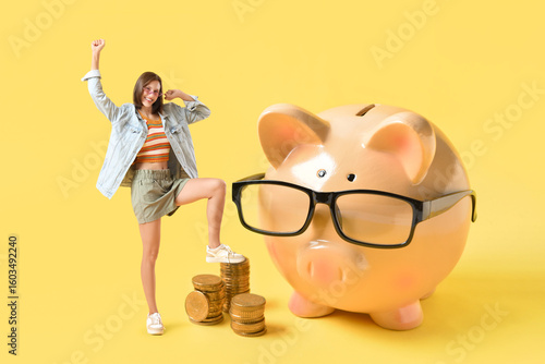 Piggy bank with eyeglasses ...