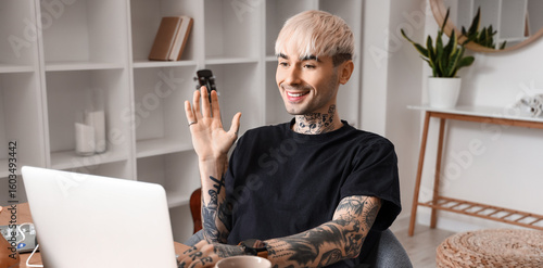 Young tattooed man video ch...