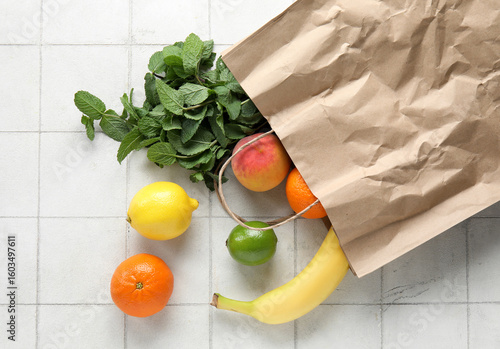 Paper bag with fruits and m...