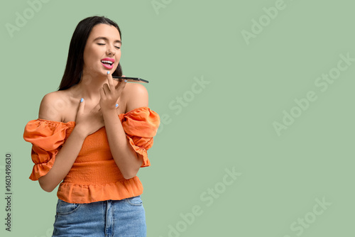 Beautiful happy young woman...