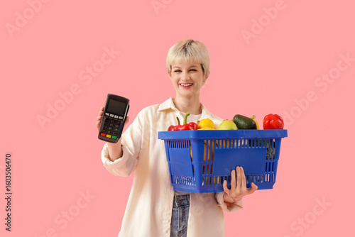 Young woman with full shopp...