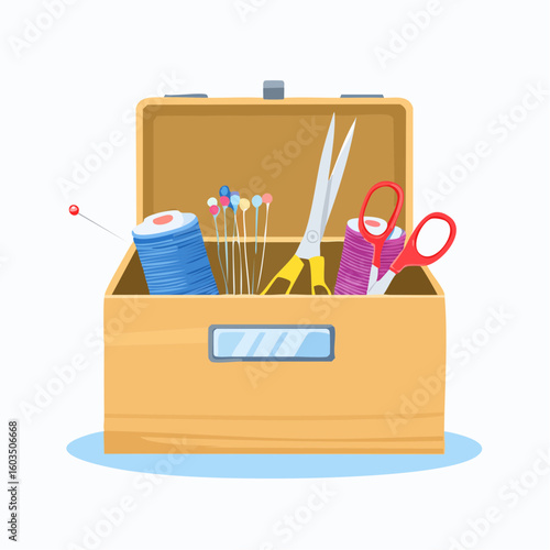Sewing kit – Open sewing box showing threads, scissors, and pins.
