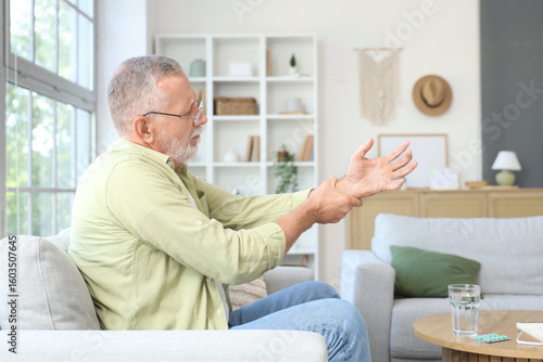 Senior man suffering from P...