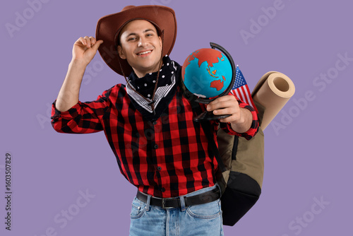 Male tourist in cowboy hat ...