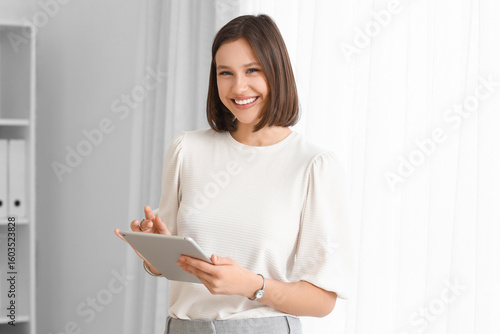 Young businesswoman working...