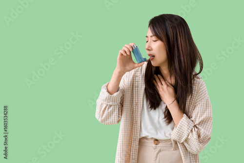 Young Asian woman with asth...