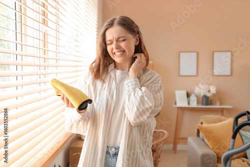 Young woman scratching hers...