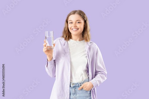 Young woman with glass of w...