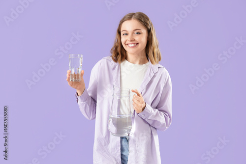 Young woman with glass and ...