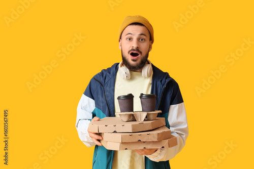 Shocked male courier with p...