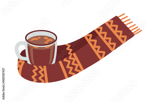 A mug of chocolate resting on a patterned scarf