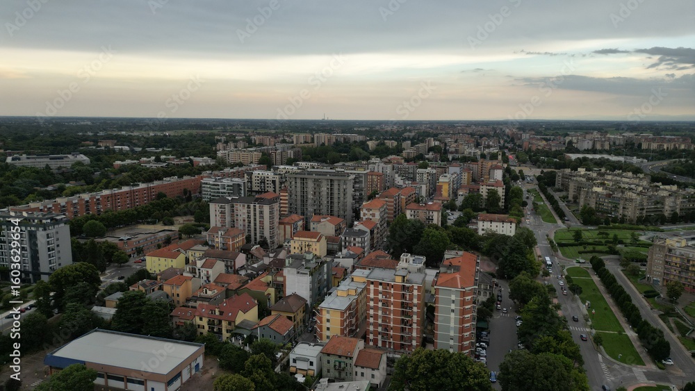Cityscape Aerial View: An aerial panorama of a bustling cityscape. a vivid view showcasing the structured arrangement of buildings, Metanopoli, San Donato Milanese, Milan, Italy Cityscape Aerial View: An aerial panorama of a bustling cityscape. a vivid view showcasing the structured arrangement of buildings, Metanopoli, San Donato Milanese, Milan, Italy