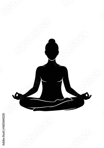 A black silhouette of a woman meditating peacefully in the classic lotus yoga position.