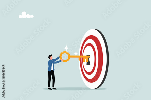 The key to success and achieving business targets, entrepreneurs put the golden key into the right target that is held to open business success.