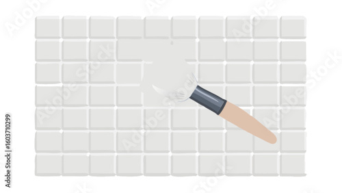 Applying white grout to bathroom tiles renovation diy project for home improvement and repair services