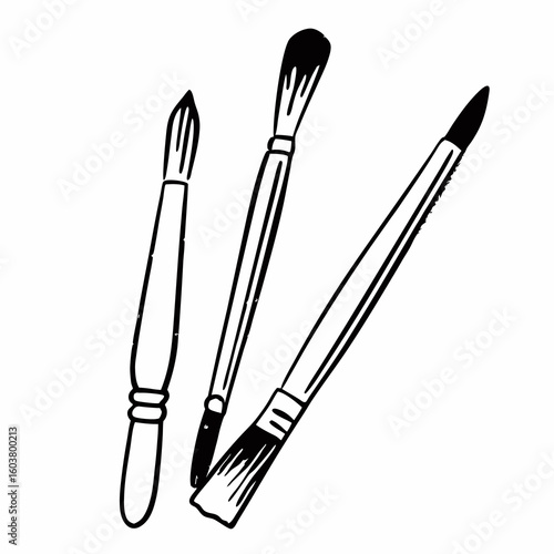 artist paint brushes in a row on a white background