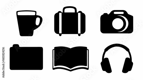 Collection of black silhouette icons including a mug, suitcase, camera, folder, book and headphones icons