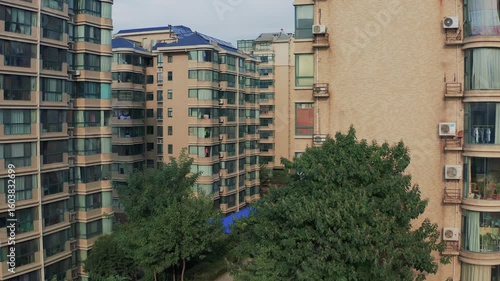 Exploring urban landscapes through aerial perspectives of city buildings and greenery