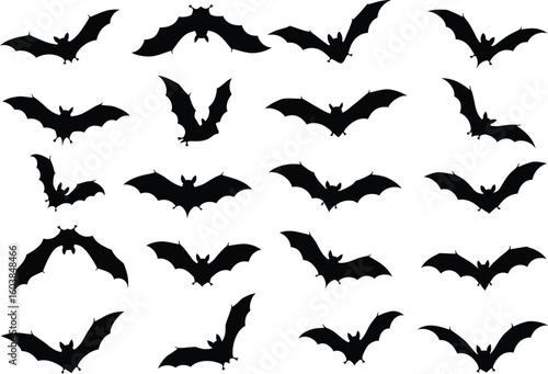 Collection of silhouetted bats in various flying poses against a white background for halloween or spooky themes