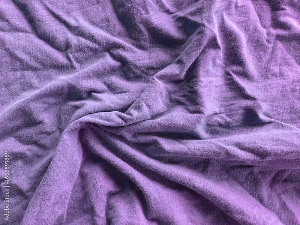 Obraz premium violet fabric background with crumpled texture
