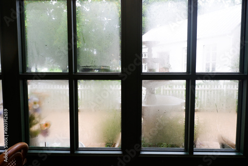 Cozy house exterior with wooden casement window and white wall rendering,Large estate home building Window Frame,minimal home concept.