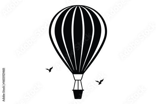 Classic hot air balloon silhouette with birds in flight