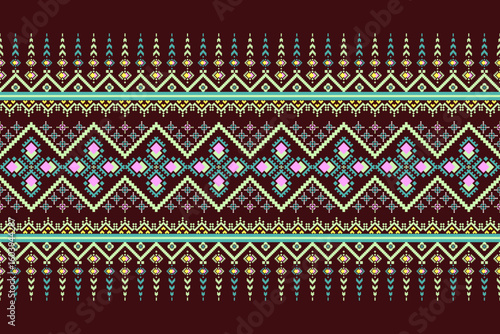 The deep red background is composed of a seamless arrangement of pixelated geometric shapes and beautiful, vibrant floral patterns.