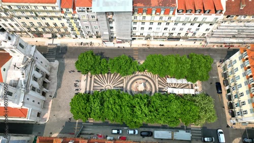 Wallpaper Mural Descending over the flowery square of Sao Paulo with its beautiful church and the magnificent Portuguese sidewalk,Lisbon,Portugal. Torontodigital.ca