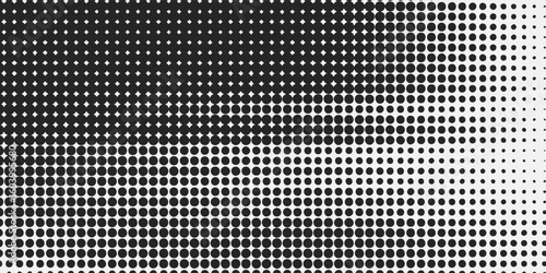 A high-contrast halftone dot pattern transitioning smoothly from black to white, creating a bold and eye-catching abstract texture.