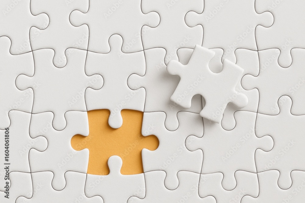 Close-Up of White Puzzle Pieces with One Missing Piece and an Individual Piece on a Yellow Background Close-Up of White Puzzle Pieces with One Missing Piece and an Individual Piece on a Yellow Background