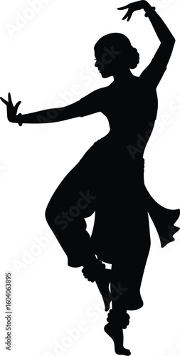 Silhouette of a graceful Indian classical dancer in a poised pose