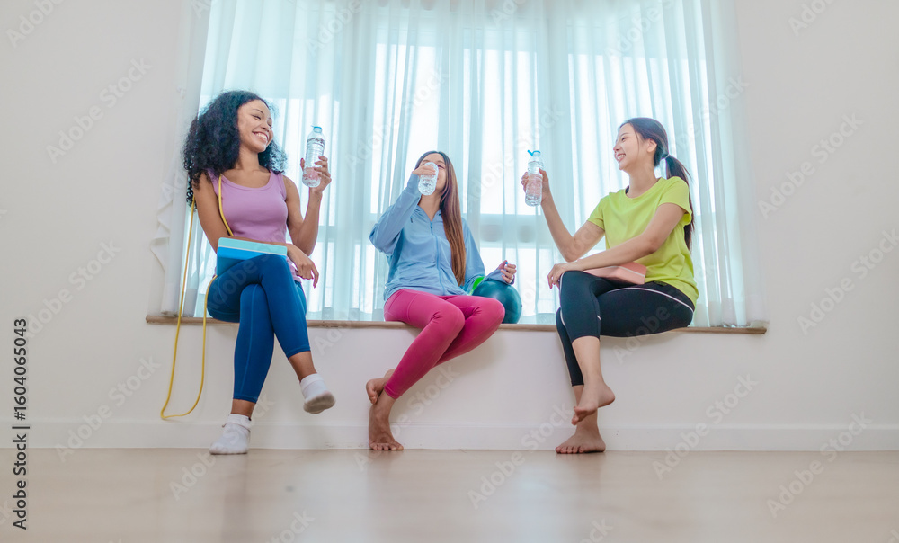 Naklejka premium Diverse Group of Female Friends Resting After Workout