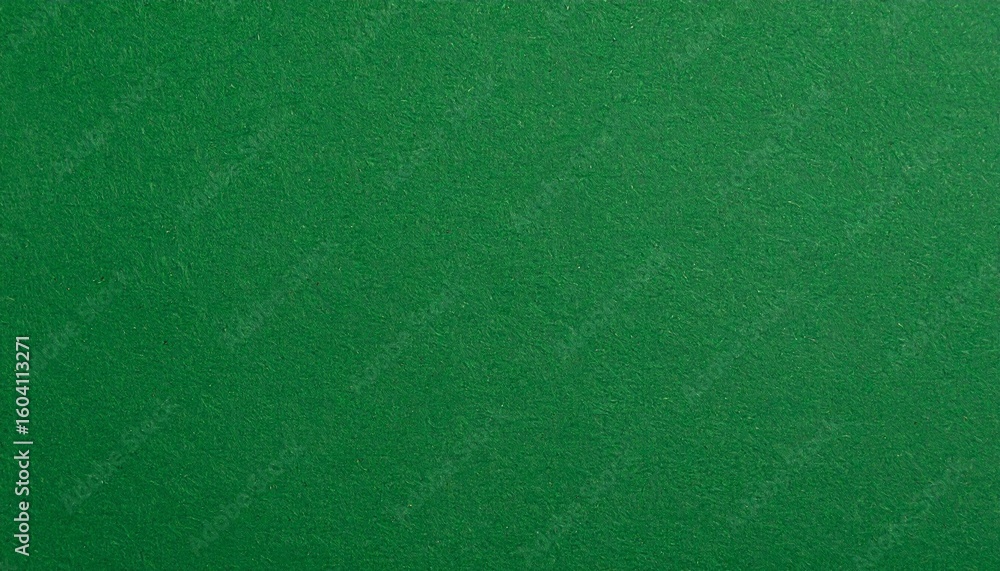 Fototapeta premium A solid green textured surface resembling felt fills the frame—evoking freshness, simplicity, and tactile calm through a minimal color and material study.
