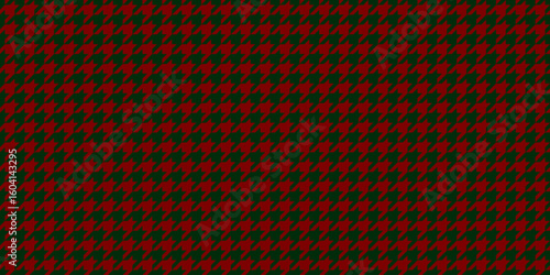 Red and green houndstooth pattern.  Classic textile design ideal for fashion, websites, or holiday projects.  Elegant, repeating texture offers a sophisticated visual appeal.