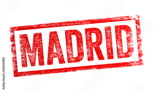 Stamped text with a distressed texture that reads - MADRID in all capital letters, resembling a passport or travel stamp