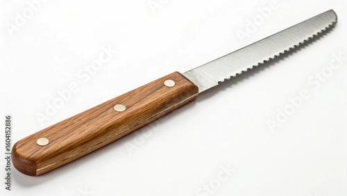 Steak knife with a wooden handle isolated on white background