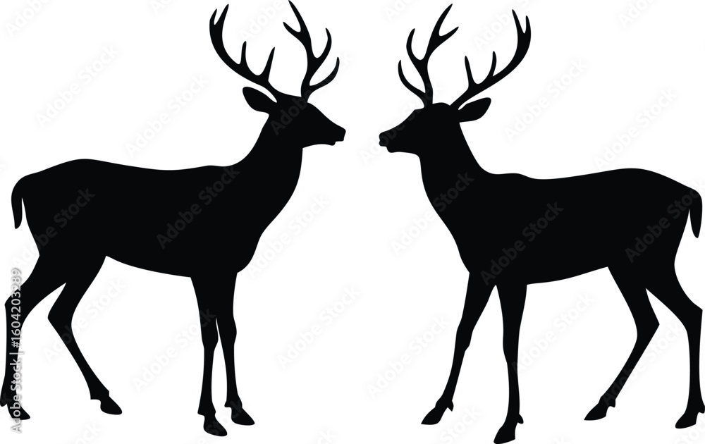 Fototapeta premium Elegant Black Silhouette of Two Deer with Antlers Facing Each Other on White Background